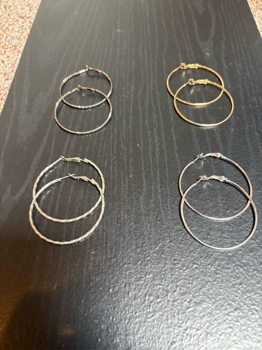 Assortment of 2” hoops: silver, textured silver, gunmetal & gold filled.